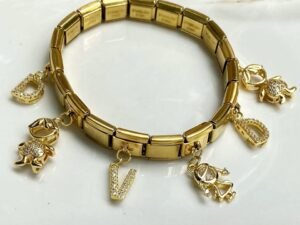Pulsera Italiana dorada con 6 charms