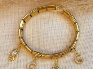 Pulsera Italiana dorada con 4 charms