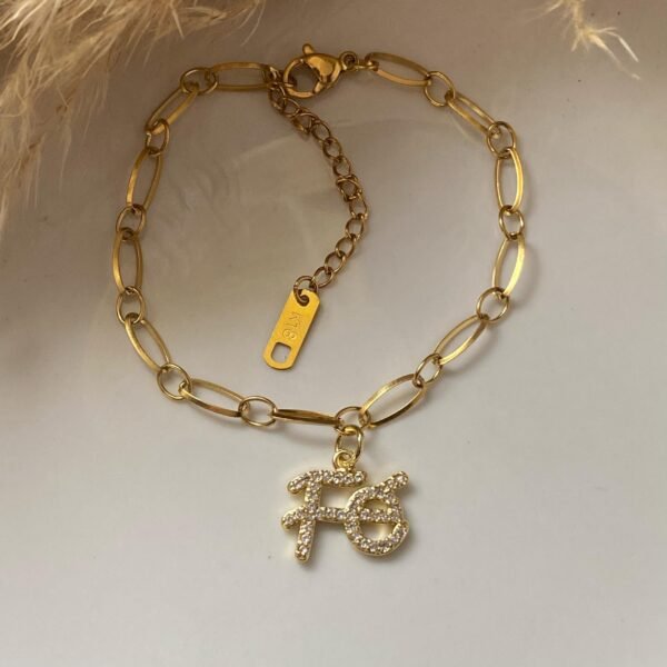 Pulsera P2 dije Fe acero inoxidable con baño de oro de 18k