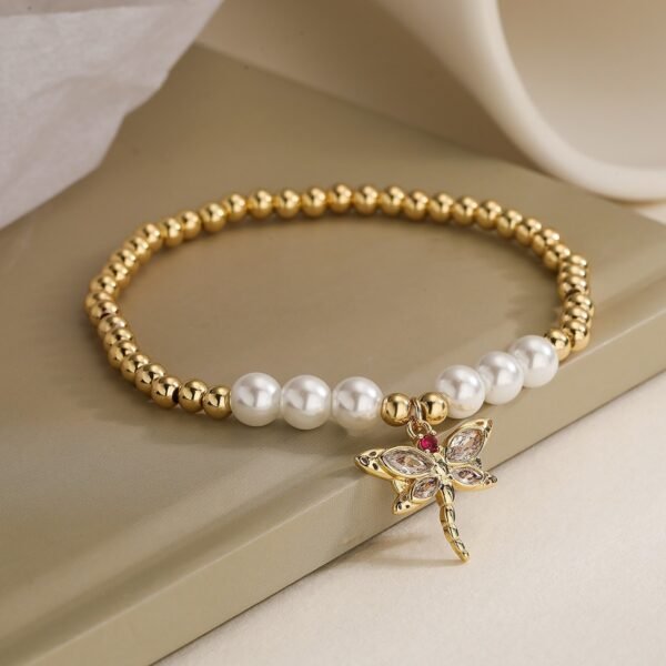 PULSERA CUENCAS DORADAS DIJE LIBELULA