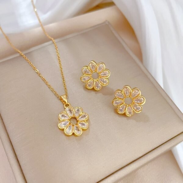 SET FLOR DORADA OCHO PETALOS DE CRISTAL