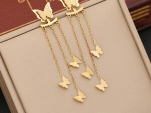 ARETES LARGOS DORADOS MARIPOSAS COLGANTES