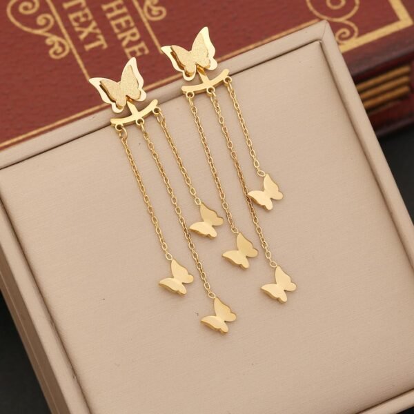 ARETES LARGOS DORADOS MARIPOSAS COLGANTES