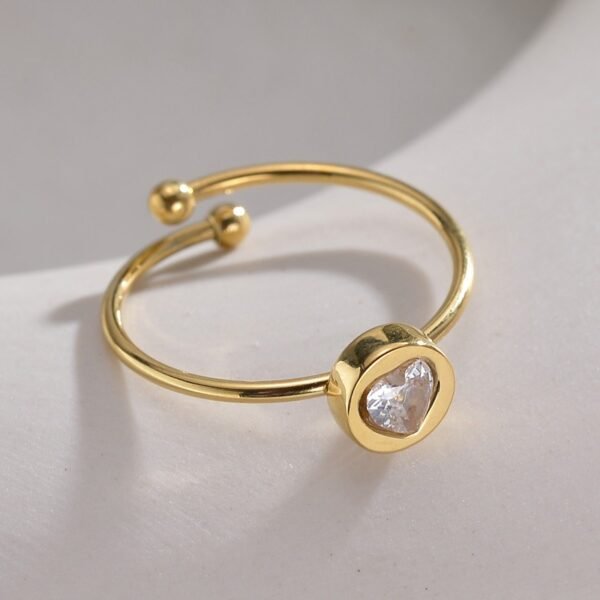 Anillo dorado ajustable corazón cristal
