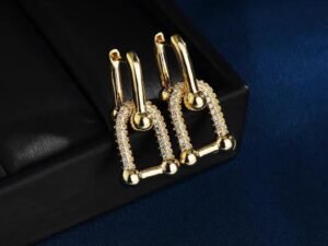 Aretes dupe dorados con circonias Tiffany & Co