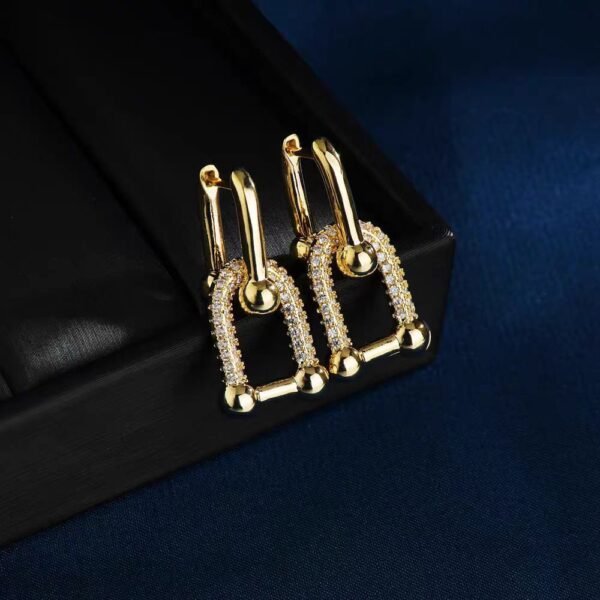 Aretes dupe dorados con circonias Tiffany & Co