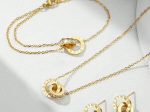Set dorado números romanos con circonias