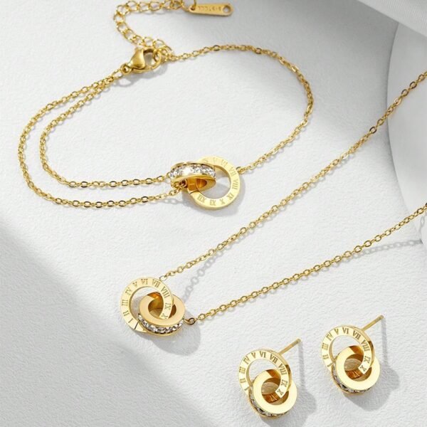 Set dorado números romanos con circonias