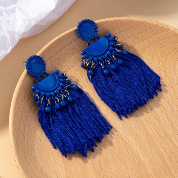 Aretes largos de fantasia fina azul pavo