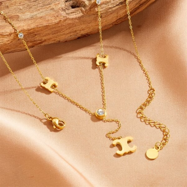 Collar dorado doble C colgante circonia