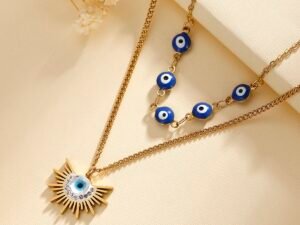 Collar dorado cadena doble ojos turcos en acero inoxidable