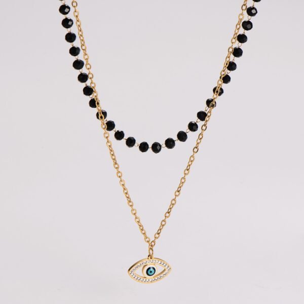 Collar dorado borlas negras ojo turco chapado en oro de 18k