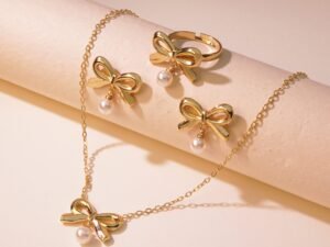 Set  dorado con dije de moño y perla blanca colgante acero inoxidable chapado en oro 18k