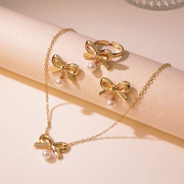 Set  dorado con dije de moño y perla blanca colgante acero inoxidable chapado en oro 18k