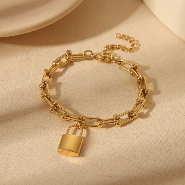 Pulsera dorada Tiffany con dije colgante candado acero inoxidable chapado en oro 18k