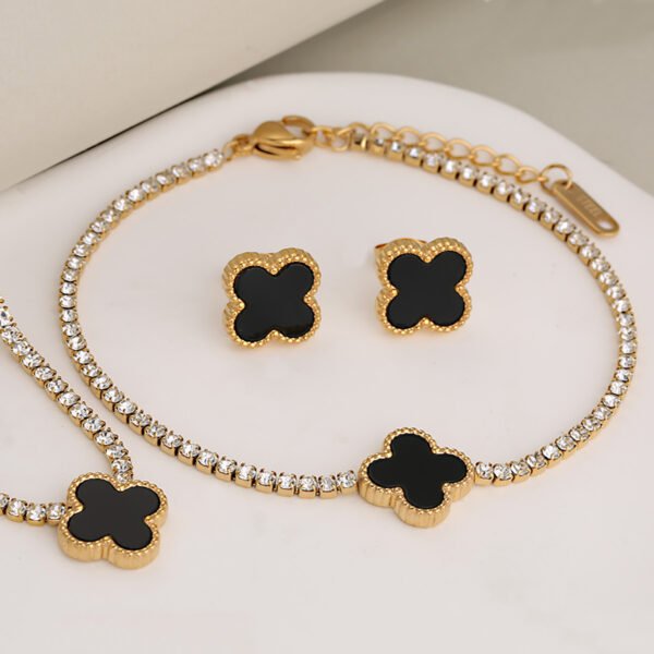 Set dorado trébol de cuatro hojas negro acero inoxidable