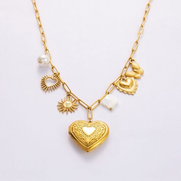 Relicario corazón dorado multi charms de acero titanio enchapado