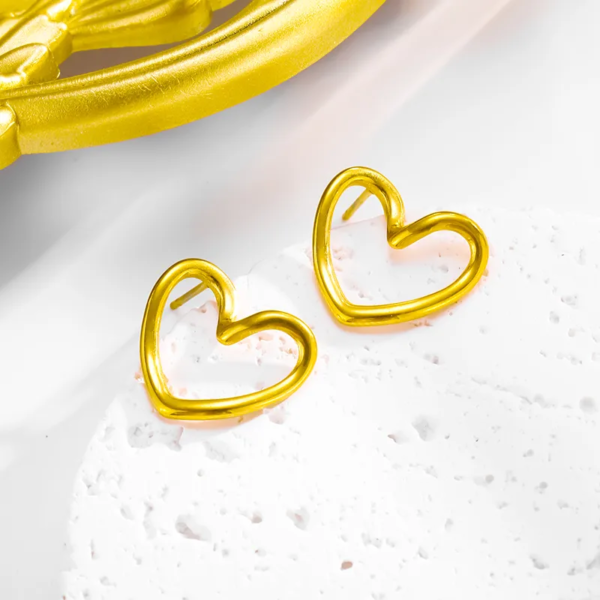 Aretes dorados corazón ahuecado acero inoxidable
