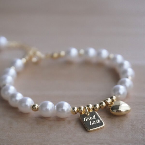 Pulsera dorada perlas Good Luck chapado en oro de 18k