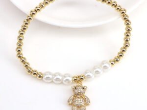 Pulsera oso cuentas doradas y perlas cobre