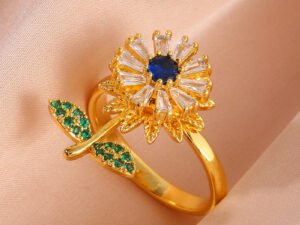 Anillo dorado girasol giratorio con circonas verdes chapa de oro