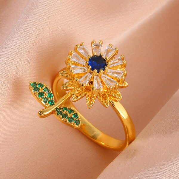 Anillo dorado girasol giratorio con circonas verdes chapa de oro