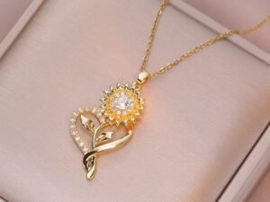 Collar dorado corazon girasol giratorio acero titanio