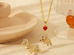 Set dorado osito full circonias con perla  chapado en oro 18k
