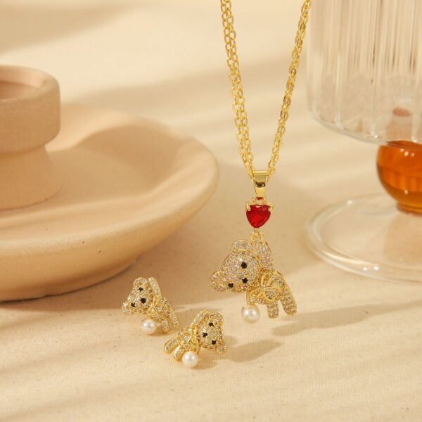 Set dorado osito full circonias con perla  chapado en oro 18k
