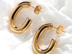 Arete dorado forma C acero inoxidable chapado en oro 18k