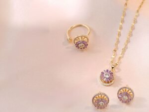 Set dorado giratorio full circonias morado acero titanio