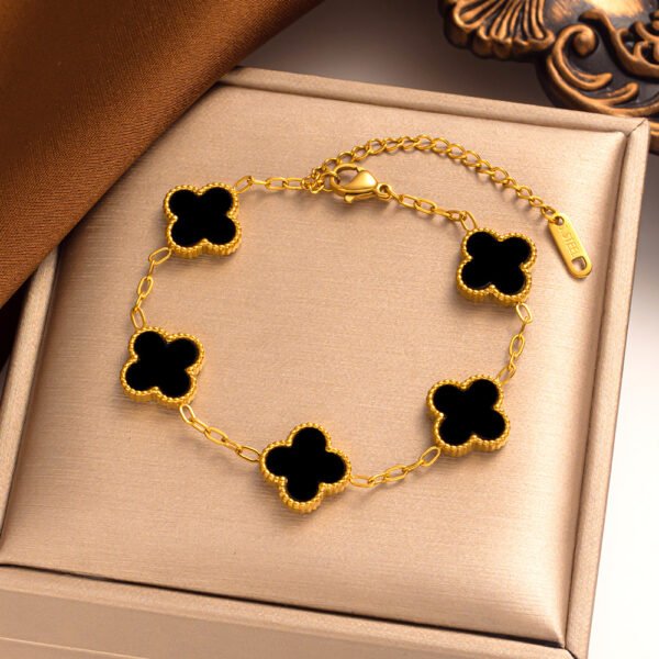 Pulsera dorada trebol negro Acero titanio