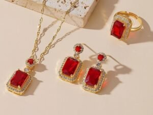 Set dorado cristal rojo en forma de cuadrado Acero titanio