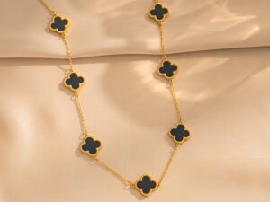 Collar dorado 7 encantos Van Cleef Acero titanio