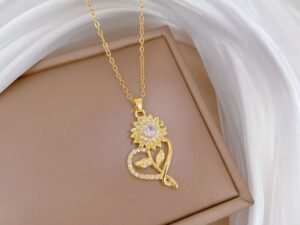 Collar dorado girasol con silueta corazon Acero titanio