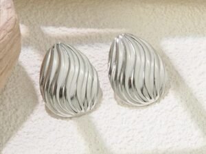 Aretes plateados ovalados lineas curveadas Acero inoxidable