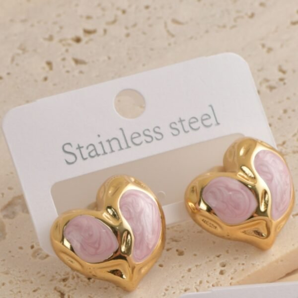 Aretes forma corazon rosado y dorado