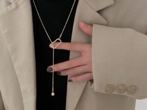 Corbatero bola acero inoxidable chapado en oro de 18k