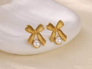Aretes lazo perla acero inoxidable chapados en oro de 18k