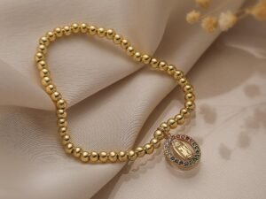 Pulsera virgen circonias de colores chapado en oro de 18k