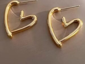 Aretes silueta corazon acero inoxidable chapado en oro de 18k