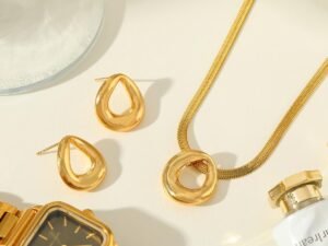 Set circulo acero inoxidable chapado en oro de 18k