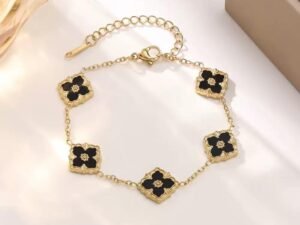 Pulsera Clover cinco motivos negros acero inoxidable chapado en oro de 18k