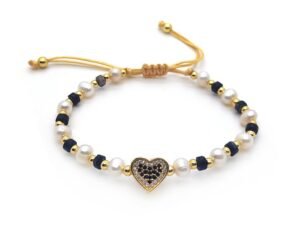 Pulsera hilo ajustable corazon negro, perlas y borlas negras chapado en oro de
