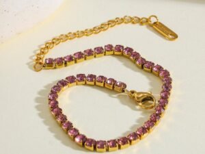 Pulsera estilo tenis zirconias rosadas chapada en oro de 18k