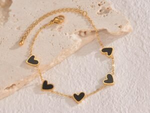 Pulsera corazones negros acero titanio