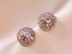 Aretes giratorios piedras Lila chapado en oro de 18k