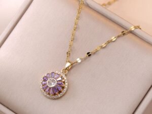 Collar giratorio piedras lila chapado en oro de 18k