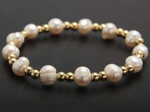 Pulsera perla cuentas doradas  acero inoxidable chapado en oro de 18k