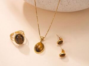 Set collar, aretes y anillo piedra cafe acero inoxidable chapado en oro de 18k